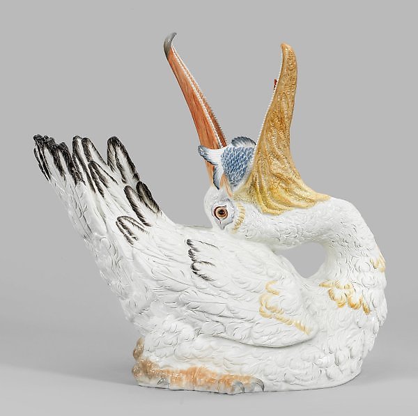 "梅森创作的真人大小动物雕塑《带鲤鱼的鹈鹕》"