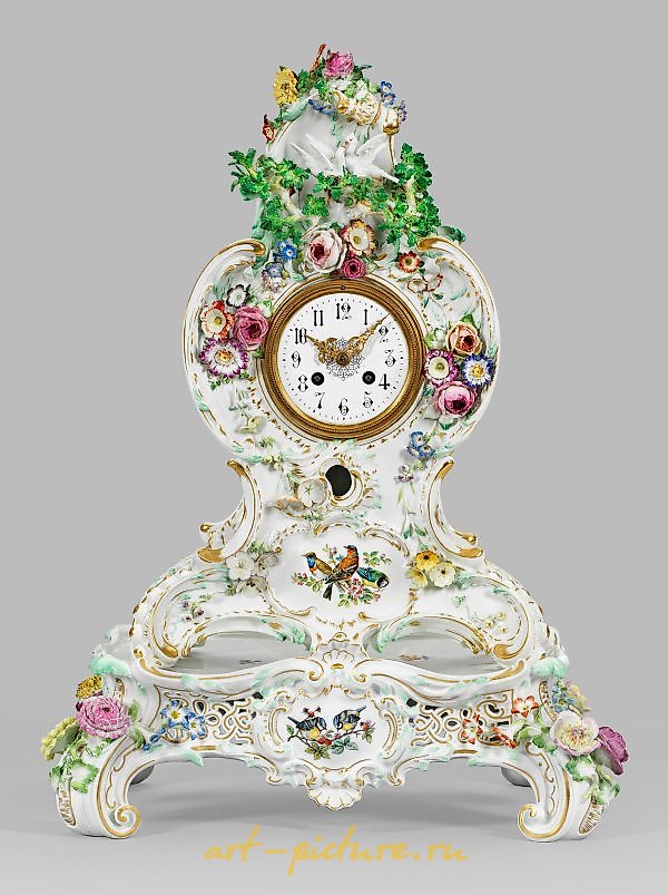 Magnificent Meissen porcelain clock with plastic decoration.