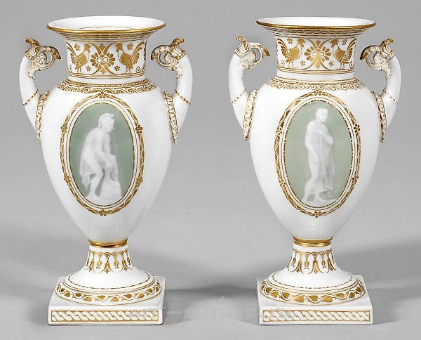 A couple of decorative vases with exquisite pâte-sur-pâte painting.