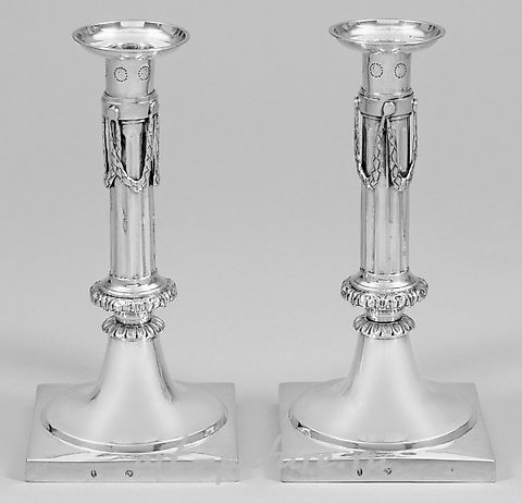 A pair of classical table candelabras