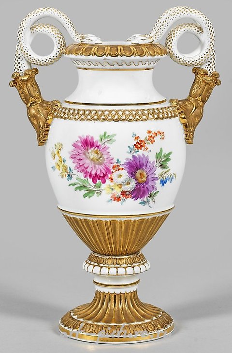 Snake handle vase with floral decoration