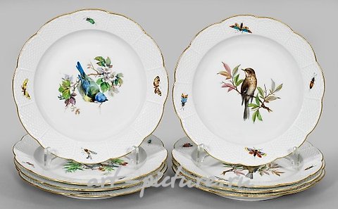An exquisite plate adorned with bird decor.