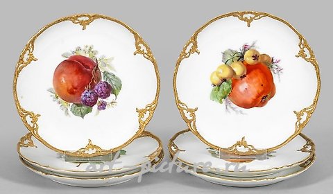 Six dessert plates with fruit decoration.