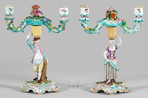 A pair of table lamps with gardener figures.