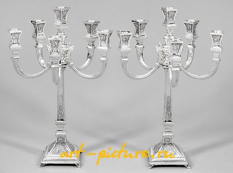 A pair of girandoles in the Baroque style.