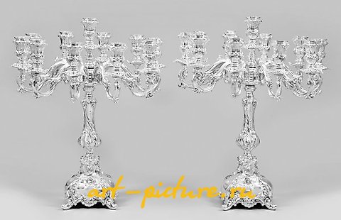 A couple of monumental and splendid girandoles in the Baroque style.