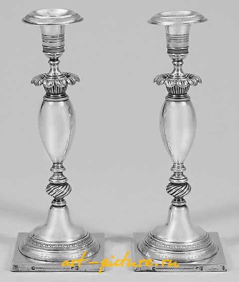 A couple of Biedermeier table candlesticks.