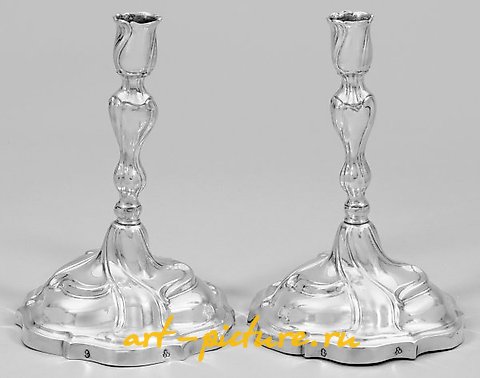 A couple of Baroque table candelabras.