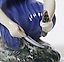 Porcelain figurine "Girl Planting Flowers" by Bing Grondahl.