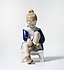 Porcelain figurine (statuette) Marianna. A girl is tying shoelaces Bing Grondahl.