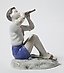 Porcelain figurine of a Boy Playing the Flute by Bing Grondahl.