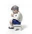 Victor. A boy drinking milk. Denmark, Copenhagen, Bing & Grondahl.