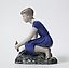 Porcelain figurine "Girl Planting Flowers" by Bing Grondahl.