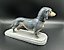 The translation of the text is: "figurine Dachshund Metzler & Ortloff Germany."