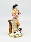Антикварная фигурка королевского Вены с изображением мужчины 18-го века, играющего на флейте с собакой