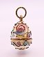 A Russian silver enamel egg pendant. 3 cm high.