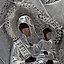 Silver oklad and two small icons of the Mother of God are...