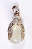 A SILVER GILT JADE BIRD HEAD PENDANT. 5.4 grams. 3 cm x 1.25...