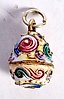 A RUSSIAN 14CT GOLD AND ENAMEL EGG PENDANT. 2.4 grams. 2 cm ...