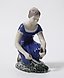 Porcelain figurine "Girl Planting Flowers" by Bing Grondahl.