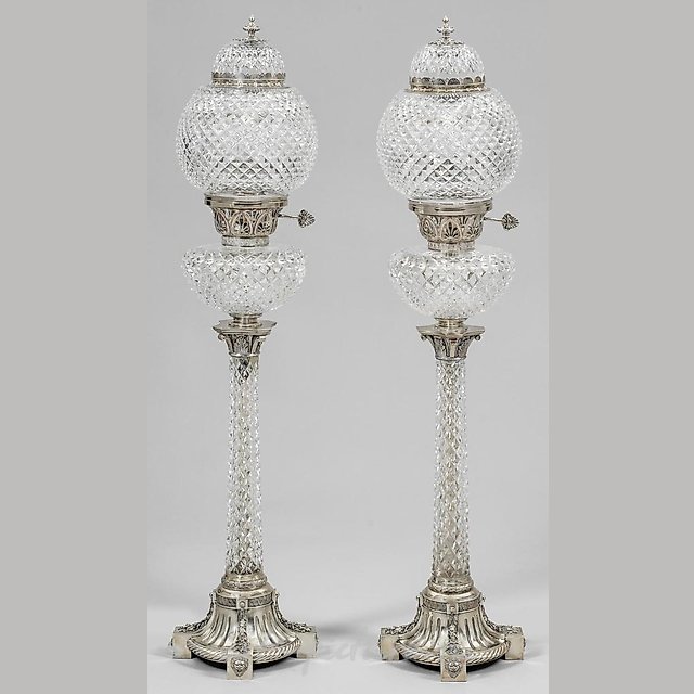 A couple of large, decorative table lamps in the Empire style.