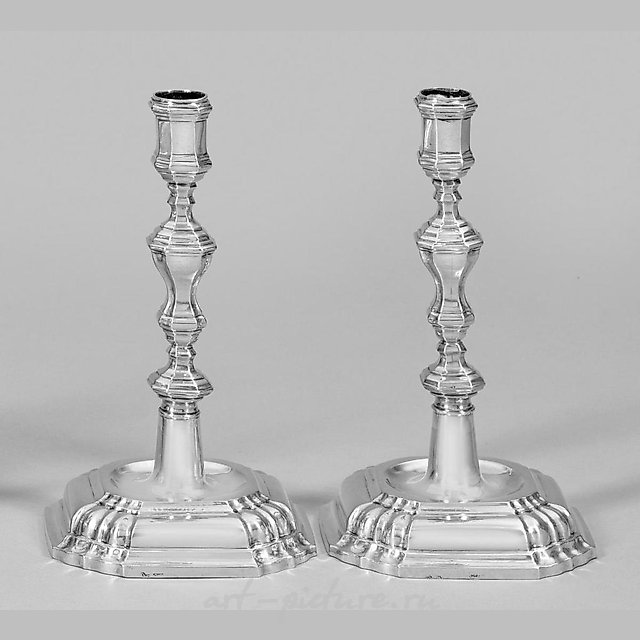 A pair of table candelabras in the Baroque style.