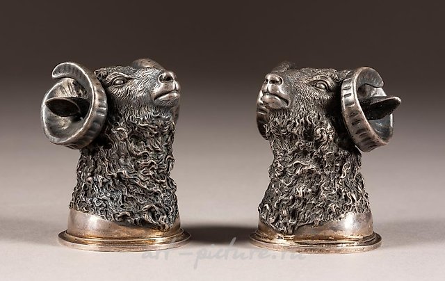 A PAIR OF MASSIVE SILVER STIRRUP CUPS