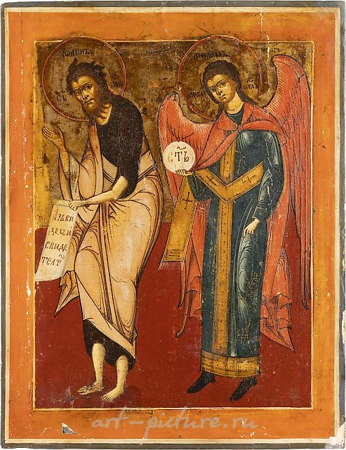A LARGE ICON SHOWING ST. JOHN THE FORERUNNER FROM A DEISIS
