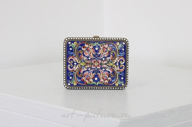 A Russian style silver-gilt and cloisonné powder compact.