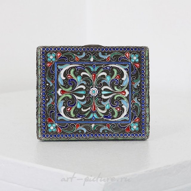 A Russian style silver and cloisonne cigarette case.