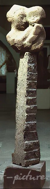 Portrait with a child, 1980, granite, 160x60x40 Author`s property