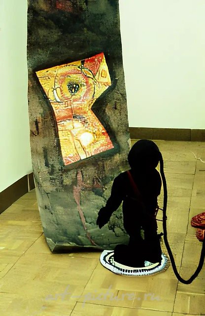 Divers` Library, 1994, object: fabric, wood, stuffing, electric lamp; scroll: paper, mixed technique. Object 120x40 cm; scroll 5