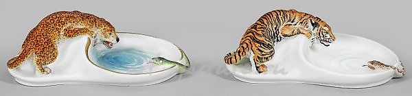 A pair of figurative bowls.