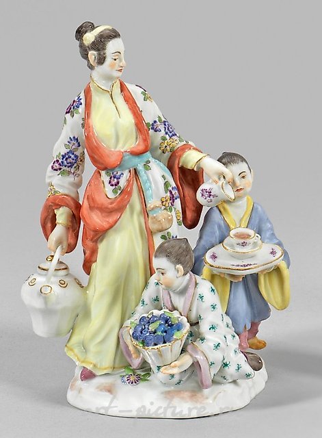 Japanese woman with a teapot and two children.
