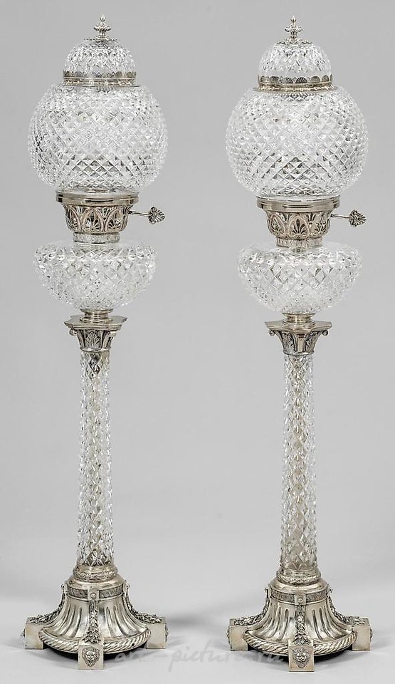 A couple of large, decorative table lamps in the Empire style.