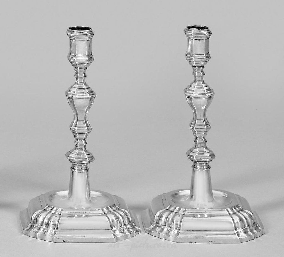 A pair of table candelabras in the Baroque style.