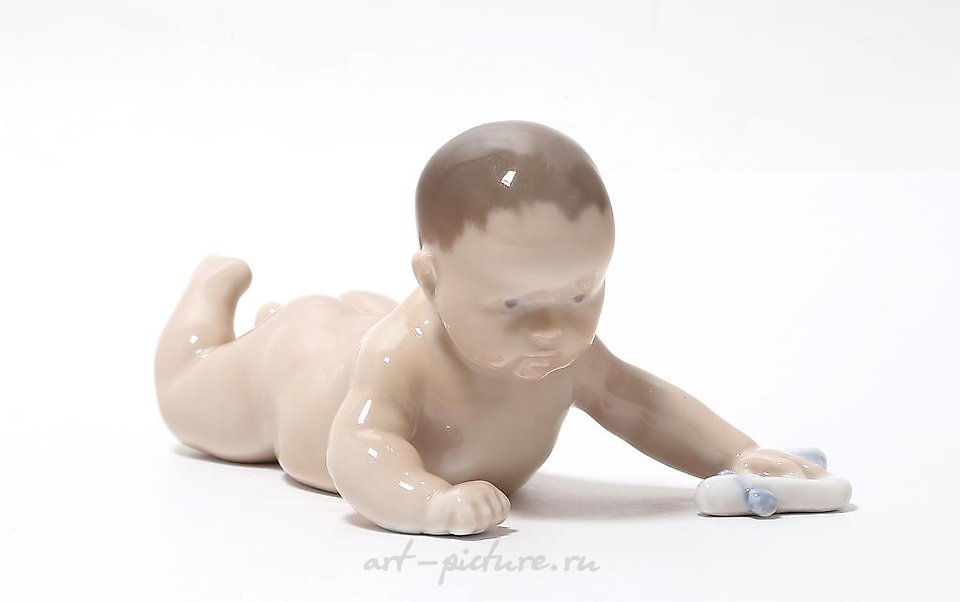 Crawling baby. Denmark, Copenhagen, Royal Copenhagen