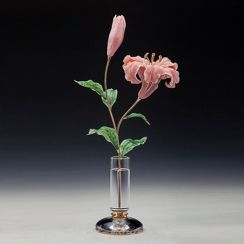 "Pink lily. Stone-carving floristics."
