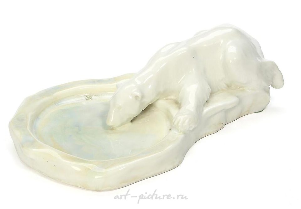 Porcelain dish in the shape of a drinking white bear by Royal Copenhagen.
