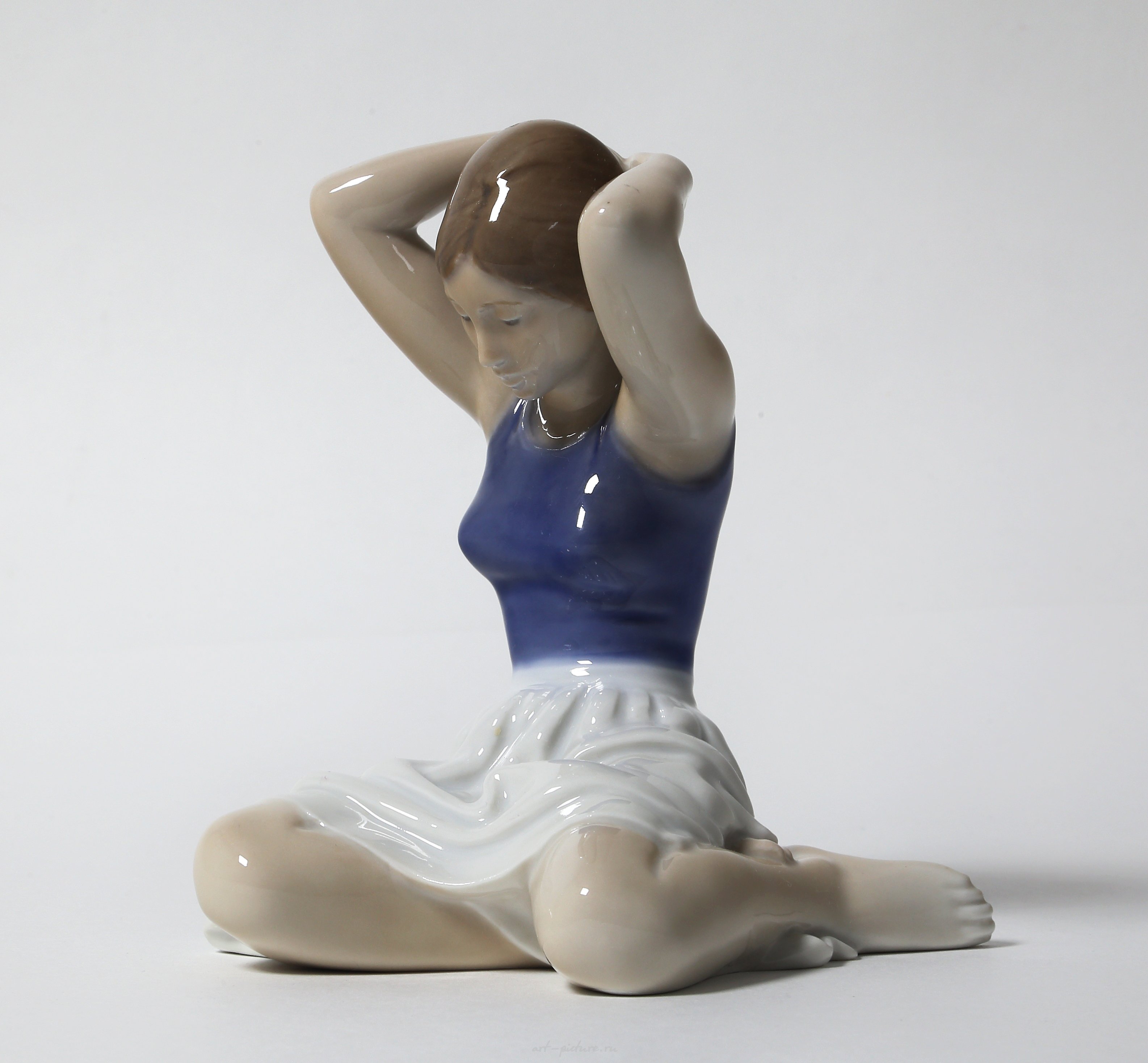 "Girl adjusting her hair. Denmark, Copenhagen, Royal Copenhagen."