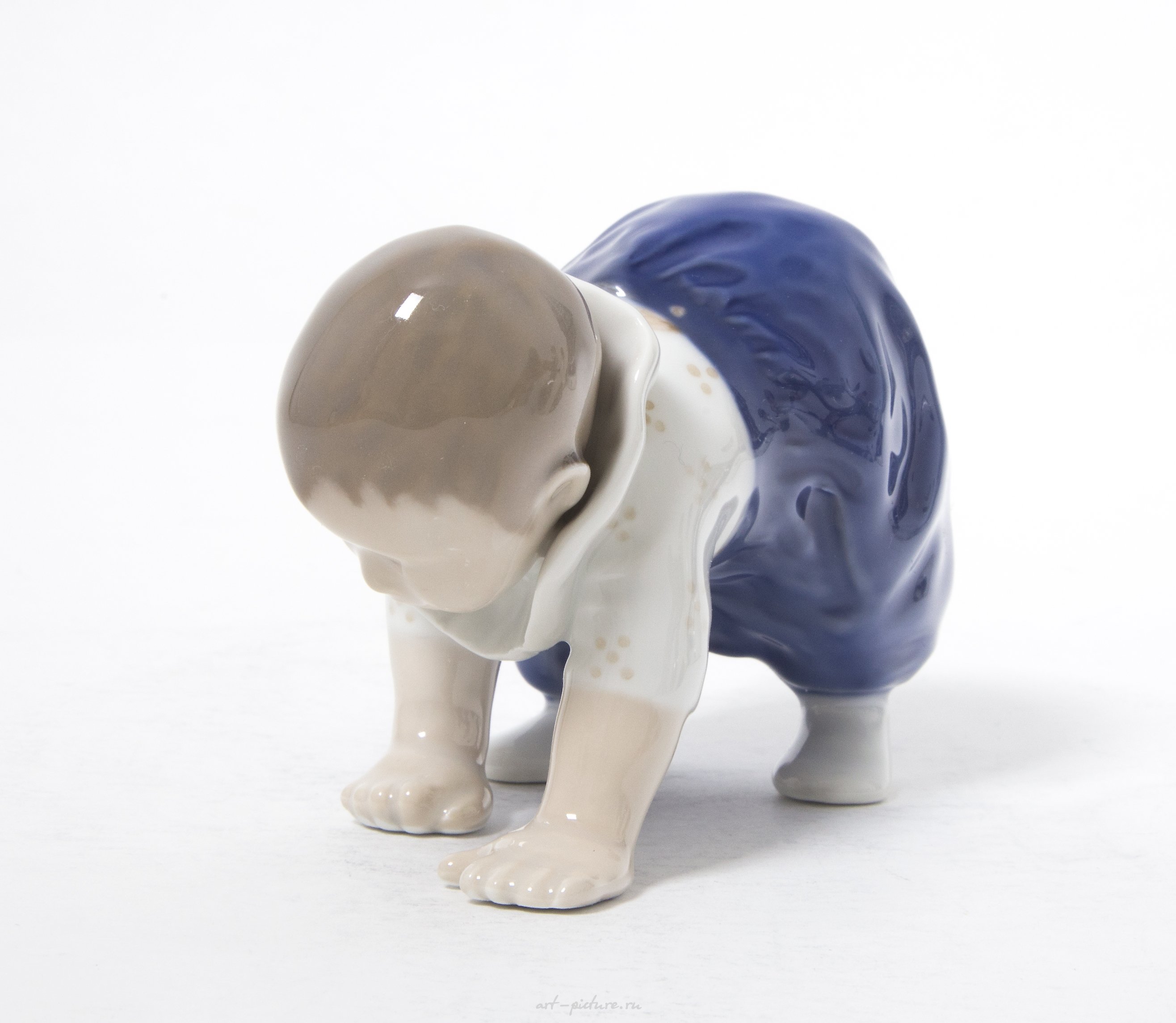 Crawling baby. Denmark, Copenhagen, Royal Copenhagen.