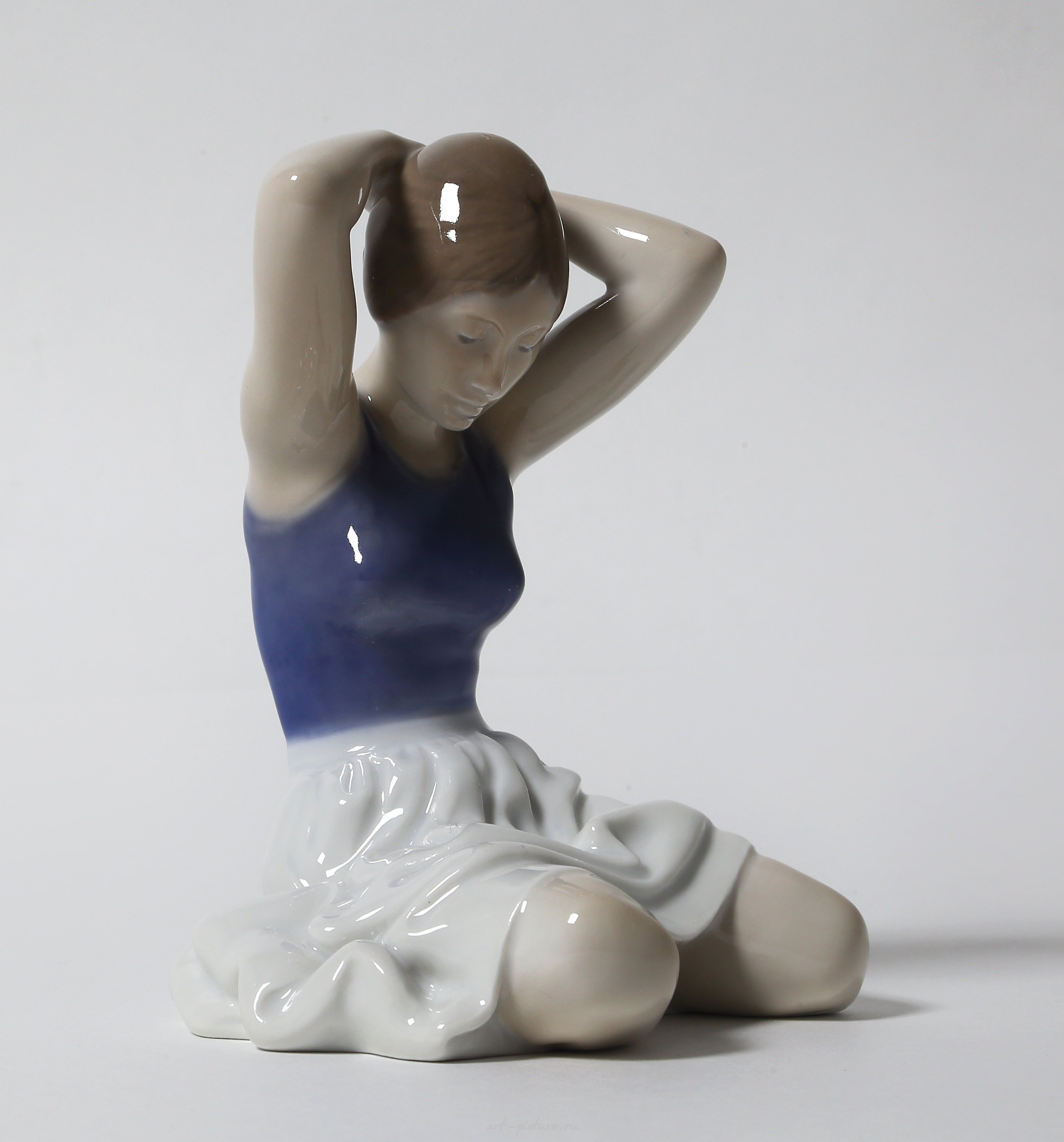 "Girl adjusting her hair. Denmark, Copenhagen, Royal Copenhagen."