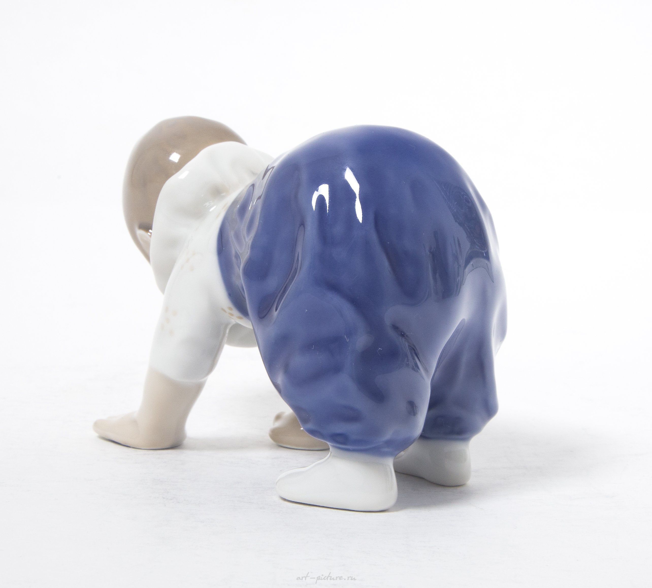 Crawling baby. Denmark, Copenhagen, Royal Copenhagen.