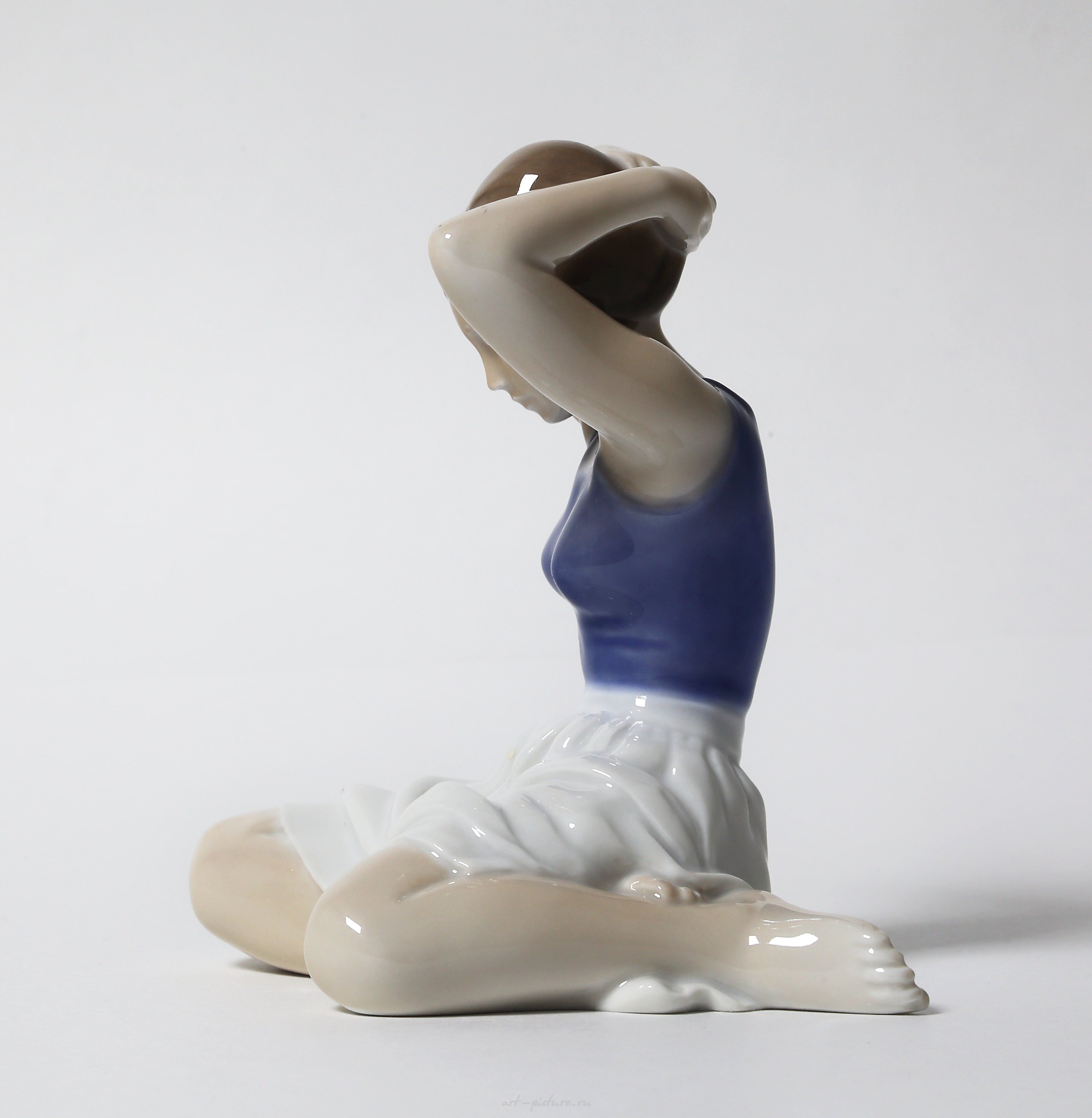 "Girl adjusting her hair. Denmark, Copenhagen, Royal Copenhagen."