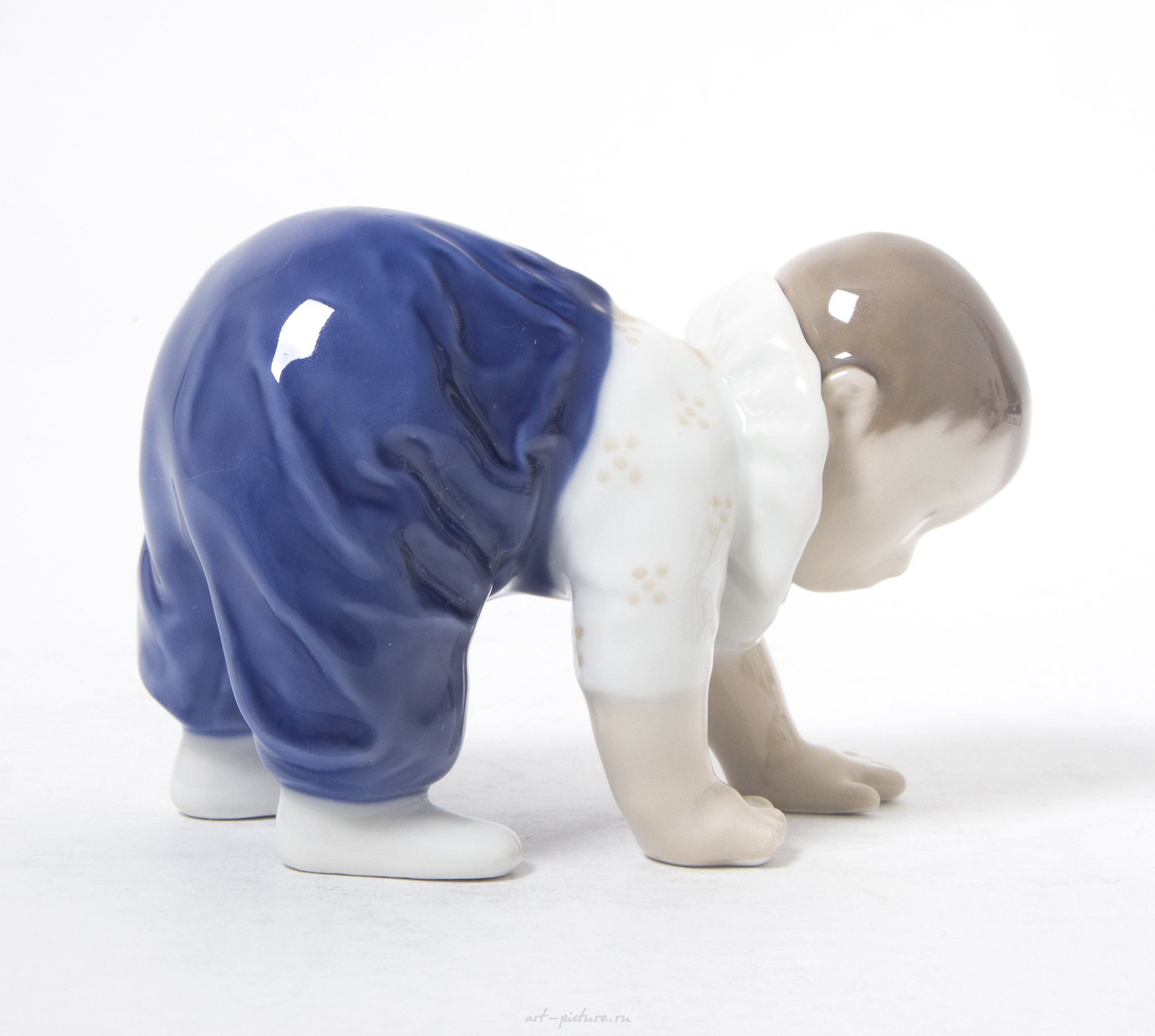 Crawling baby. Denmark, Copenhagen, Royal Copenhagen.