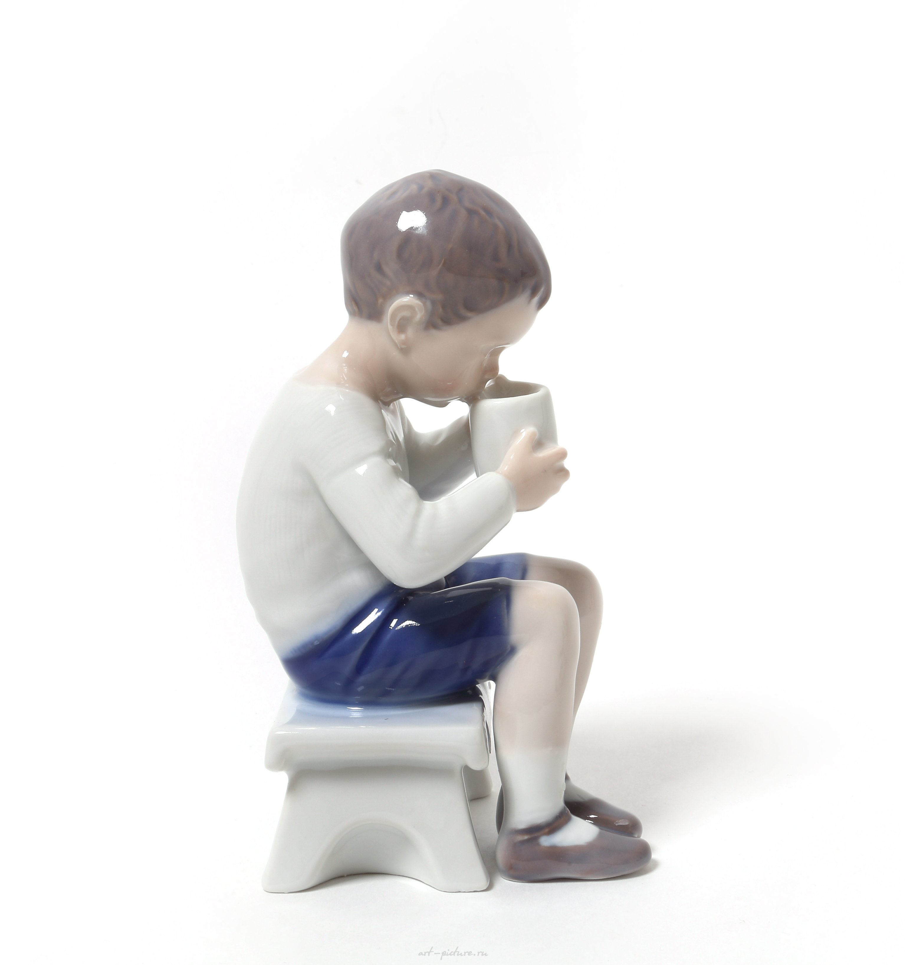 Victor. A boy drinking milk. Denmark, Copenhagen, Bing & Grondahl.