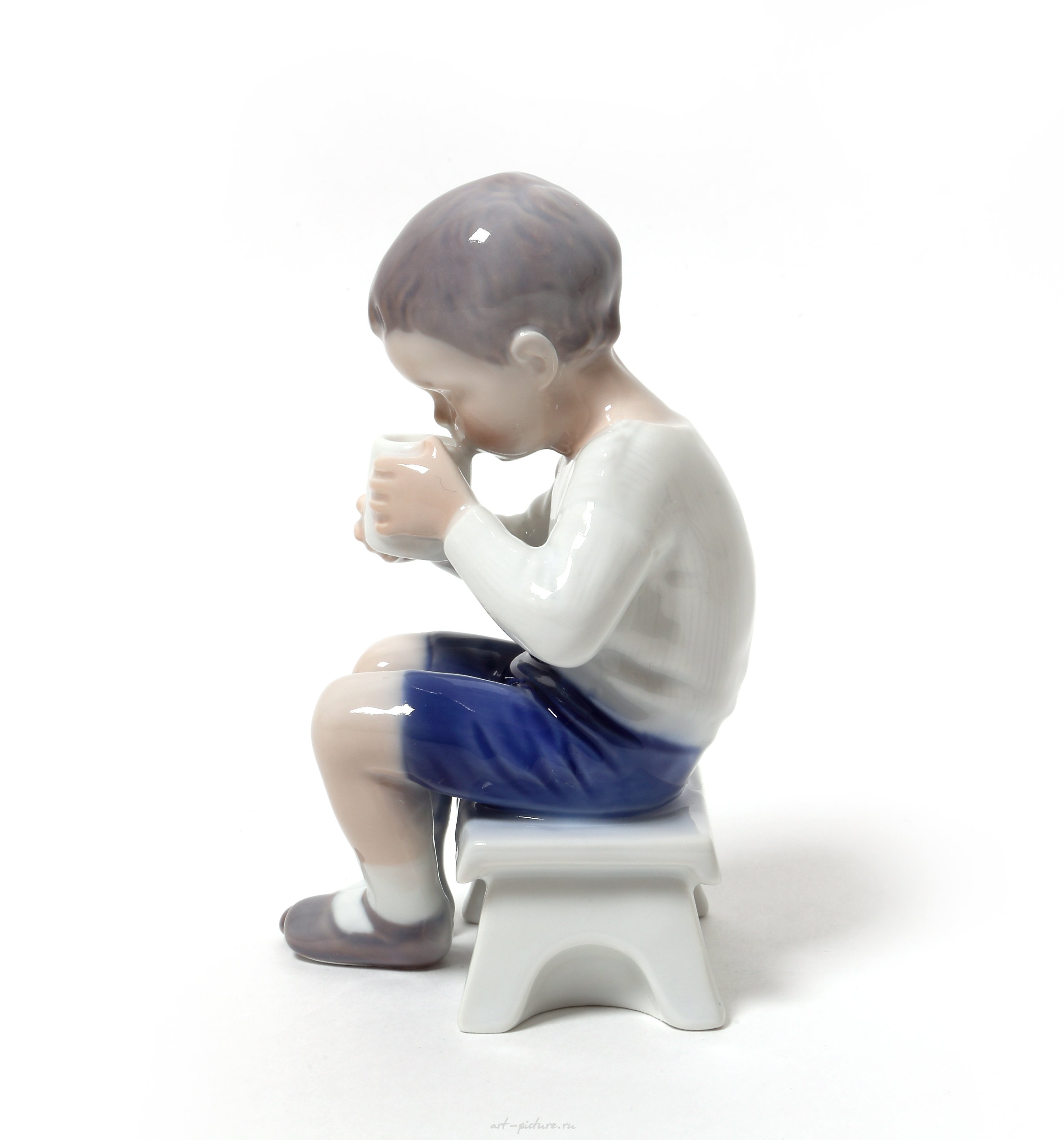 Victor. A boy drinking milk. Denmark, Copenhagen, Bing & Grondahl.