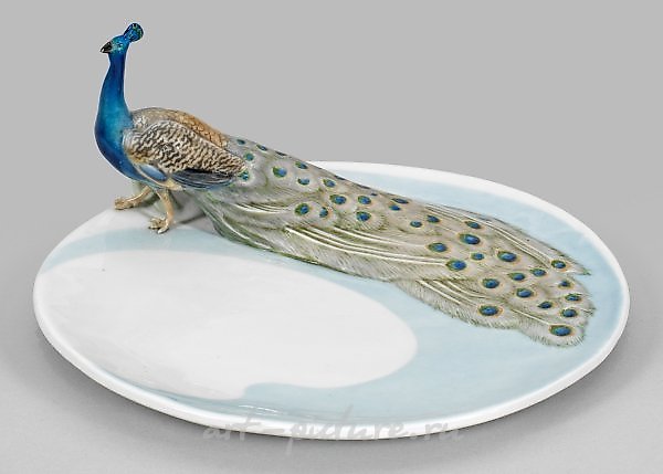 Art Nouveau-style dish with peacock figurine