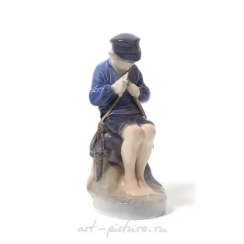 Boy carving a twig. Denmark, Copenhagen, Royal Copenhagen.