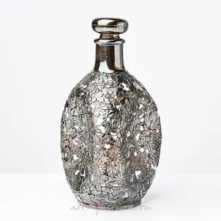 Decanter. Glass, 950 silver. China. Maximum height 22.3 cm, maximum diameter of the neck 3.5 cm.